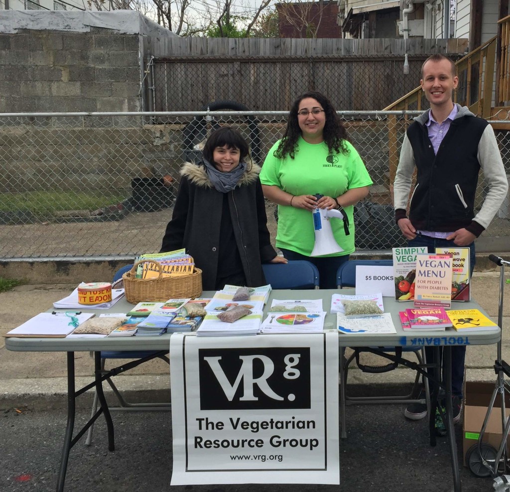 (from left to right) VRG staff member, Nina Casalena, Paul's Place Intern and Festival Chair, Emily Gebhart, and VRG volunteer, Matt Baker, RN, get ready for festival patrons at Paul's Place health event in Baltimore, MD.