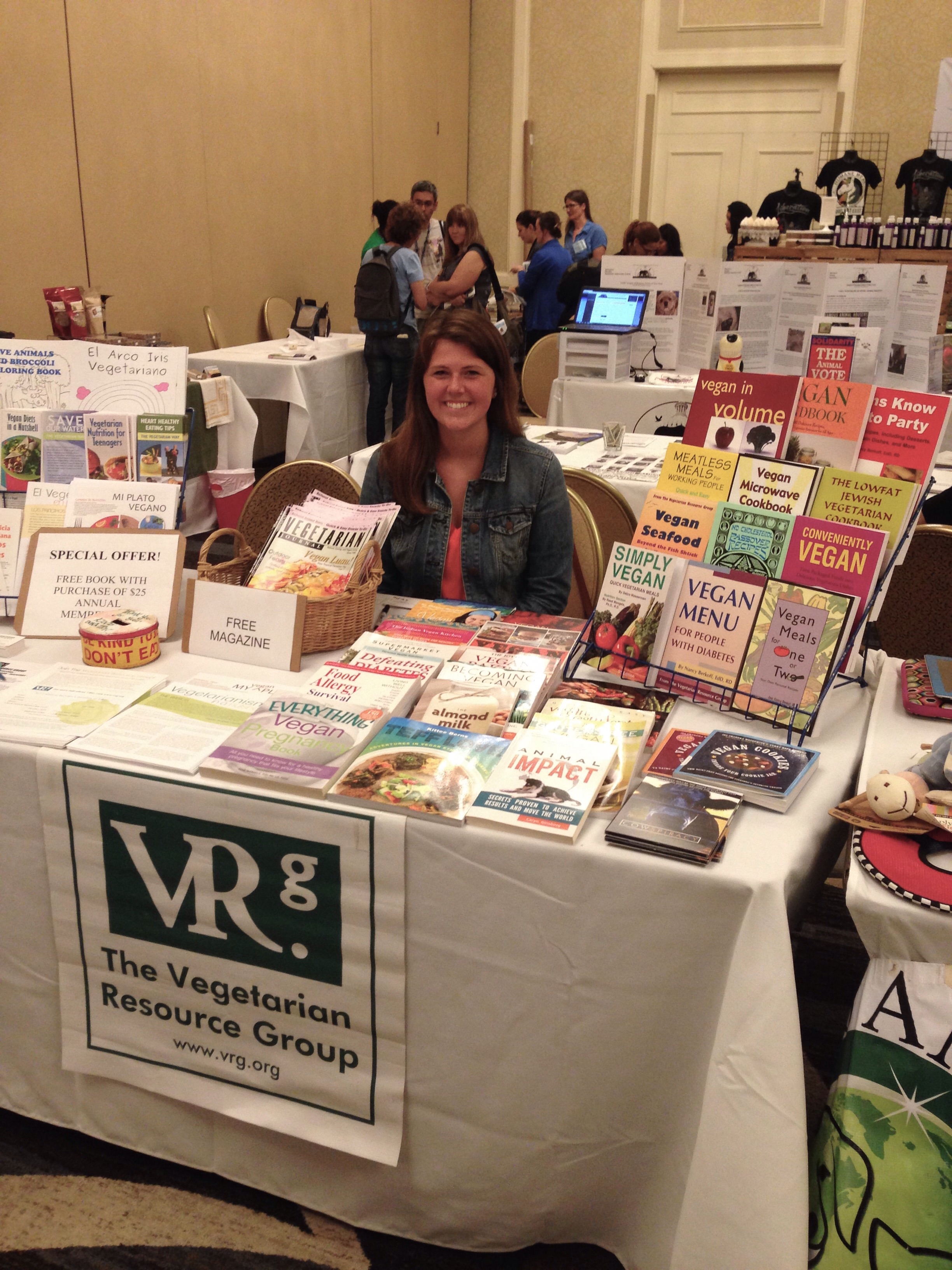 VRG Intern, Anne Custer, hard at work at The Vegetarian Resource Group's booth at the Animal Rights National Conference 2015. 
