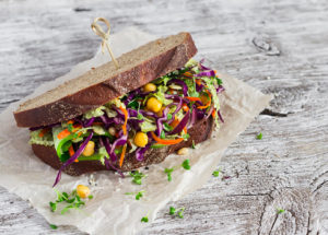 Delicious healthy vegetarian open cole slaw and a chickpea sandwich