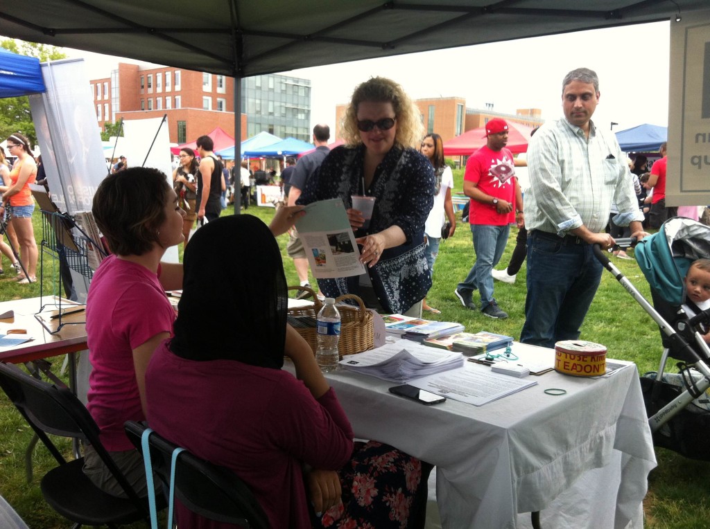 VRG Interns, Myrial Holbrook (left) and Navaal Mahdi (right) hand out copies of The Vegetarian Journal at at Baltimore VegFest 2015.